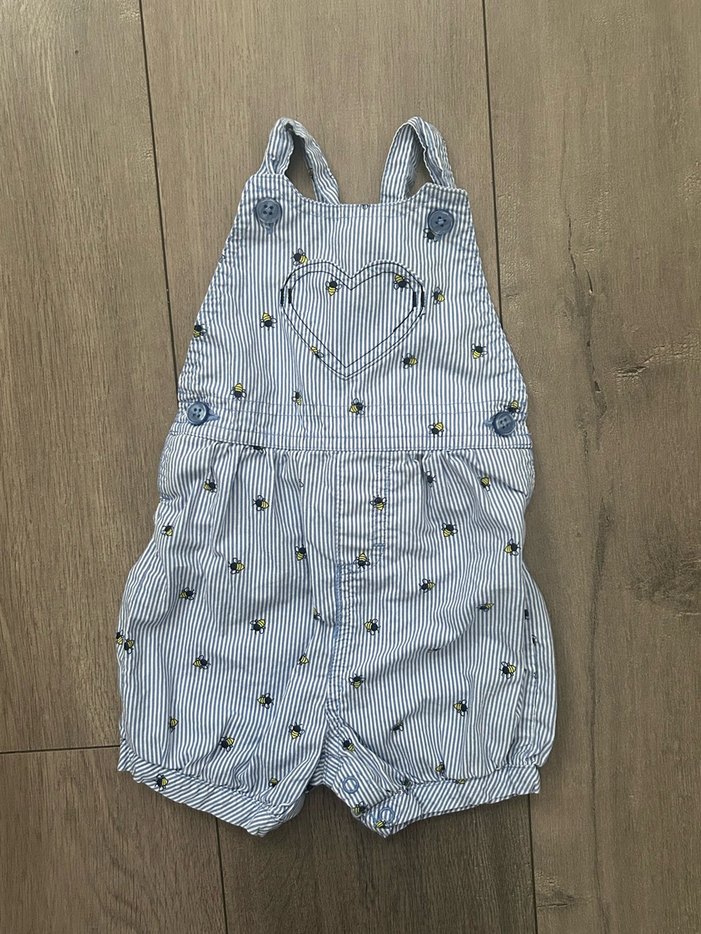 Carter's overalls featuring a blue-and-white pattern & small embroidered bees 9m